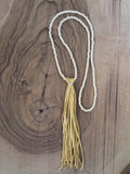 handmade natural suede tassel by Amy Weber Design - FOUND&MADE  handmade natural suede tassel by Amy Weber Design - FOUND&MADE
