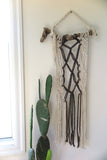 woven macrame on driftwood -FOUND&MADE