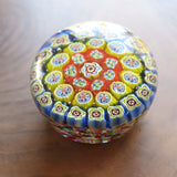 a thousand flowers glass paperweight